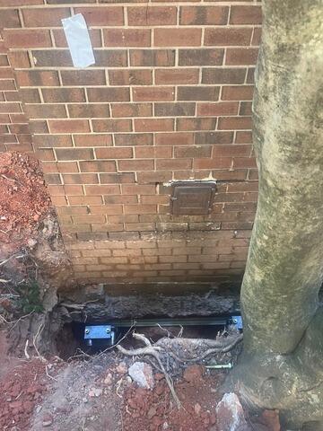 Helical Pier Installation for Settling Foundation - Raleigh, NC
