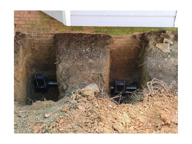 Helical Pier Installation for Foundation Stabilization - Henderson, NC - Before Photo