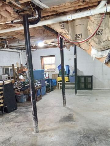 Strengthening a West Jefferson, NC Basement with SmartJack Support System - Before Photo