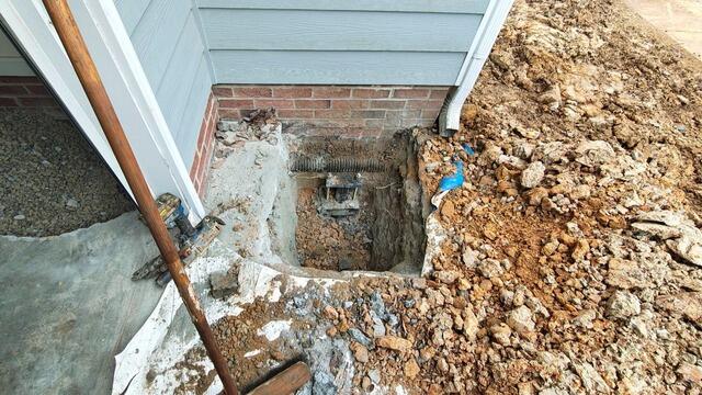 Helical Pier Installation Stabilizes Settling Foundation in Durham, NC - Before Photo