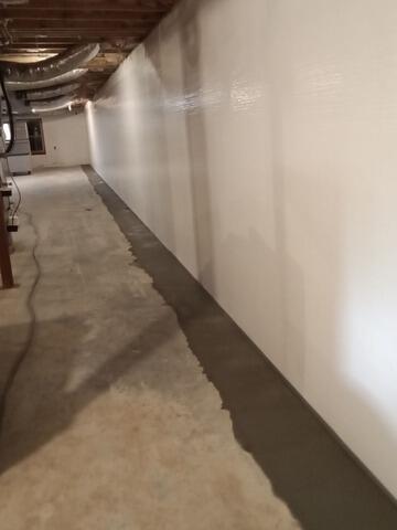 Basement Water Intrusion Addressed with Interior Waterproofing System | Mocksville, NC - After Photo
