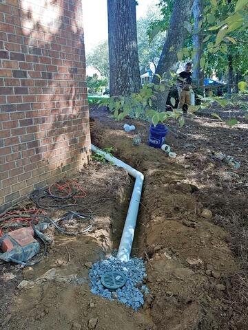 Exterior Drainage System Installation in Kernersville, NC - Before Photo
