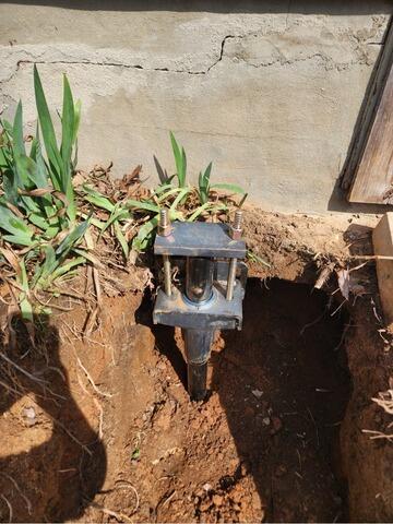Foundation Stabilization with Helical Pier Installation in Winston-Salem, NC - Before Photo