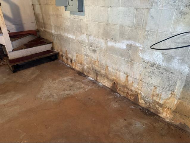 Persistent Basement Water Intrusion Solved in Winston-Salem, NC - Before Photo