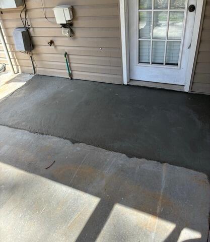 Sinking Entryway Slab Stabilized with Helical Piers in Advance, NC - After Photo