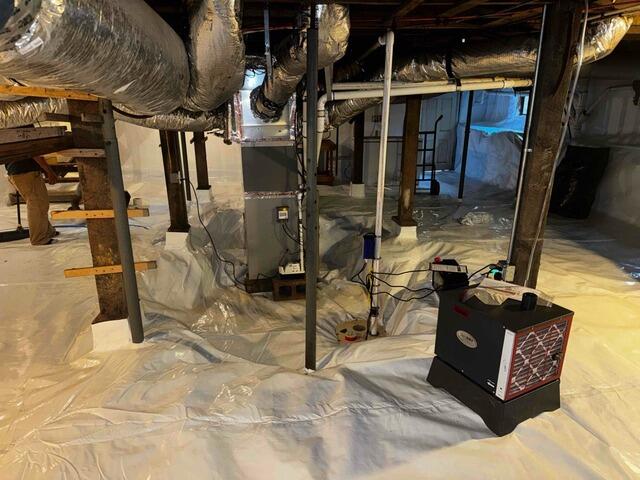 Wet, Musty Crawl Space Transformed with Complete Waterproofing System in Winston-Salem, NC - After Photo