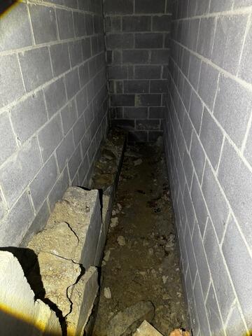 Basement Waterproofing with Vapor Barrier & Sump Pump in Blowing Rock, NC - Before Photo