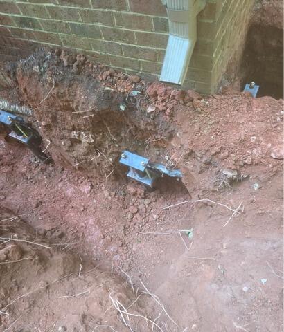 Helical Pier Installation for Foundation Stabilization in Raleigh, NC - Before Photo