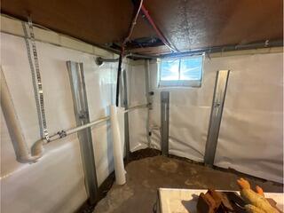 Bowing Wall Repaired with GeoLocks Wall Anchors!