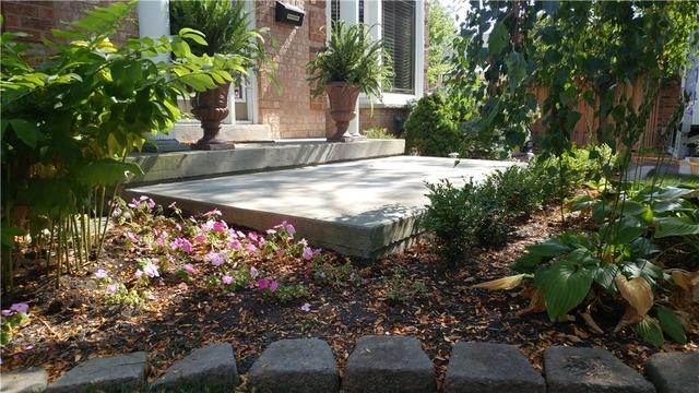 Sinking Front Patio & Foundation Water Intrusion Repair in Mississauga, Ontario - After Photo