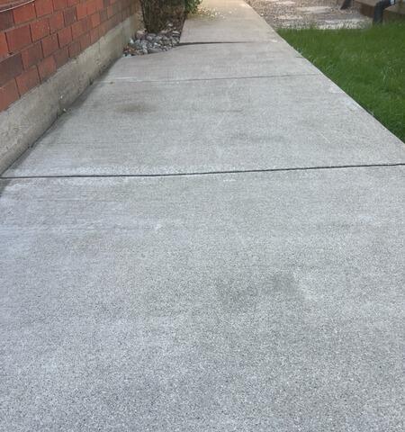 Backyard Walkway Restored After Soil Settlement - Before Photo