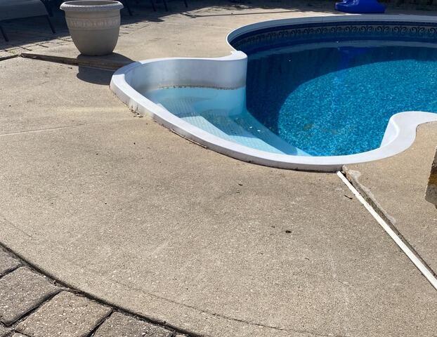 Poolside Concrete Repair & Leveling in Ajax, Ontario - Before Photo