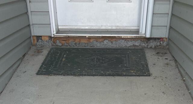 Concrete Porch Lifting & Leveling in Terra Cotta, Ontario - Before Photo