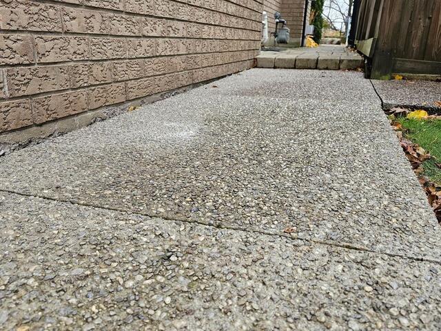 A Sinking Walkway Turned Drainage Nightmare-Solved in Ancaster, Ontario - Before Photo