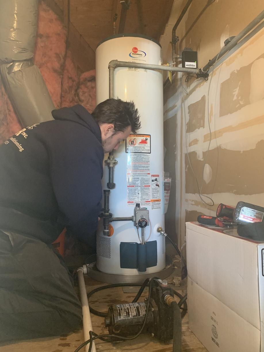 Air Inc. Heating and Air Conditioning Before & After Photo Set Installation of a 40 Gallon Gas