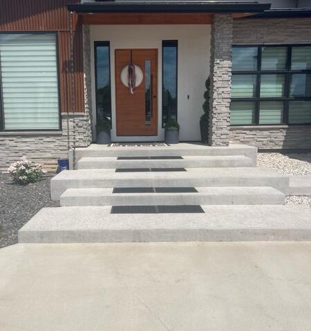 Incoming Concrete Stair Transformation with Vuba Stone Overlay