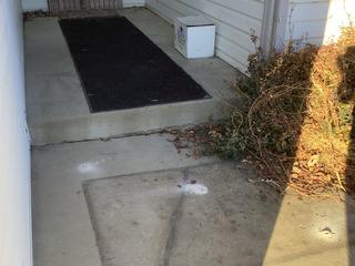 Fallen landing lifted with PolyLevel in Evans, CO