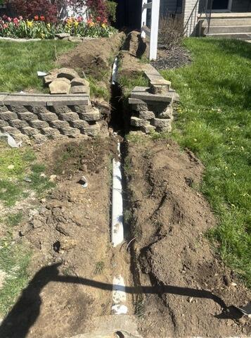 Extending the Downspouts of a Home in Grandview Heights, Columbus, OH - Before Photo