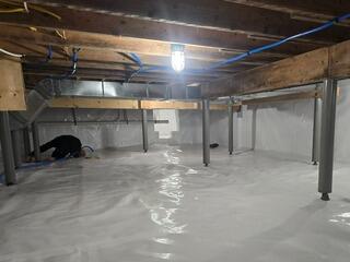Sagging Floor in Luna Pier, MI Stabilized with Crawl Space Support