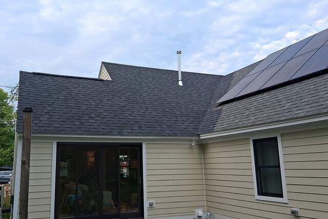 Rear roof installation in Williamstown, MA using shingle color: Granite Black