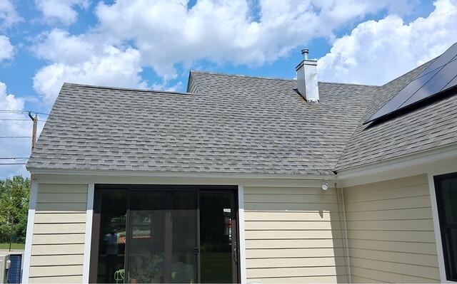 Rear roof installation in Williamstown, MA using shingle color: Granite Black