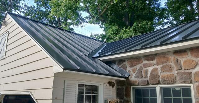 Standing seam metal roofing installation in New Lebanon, NY