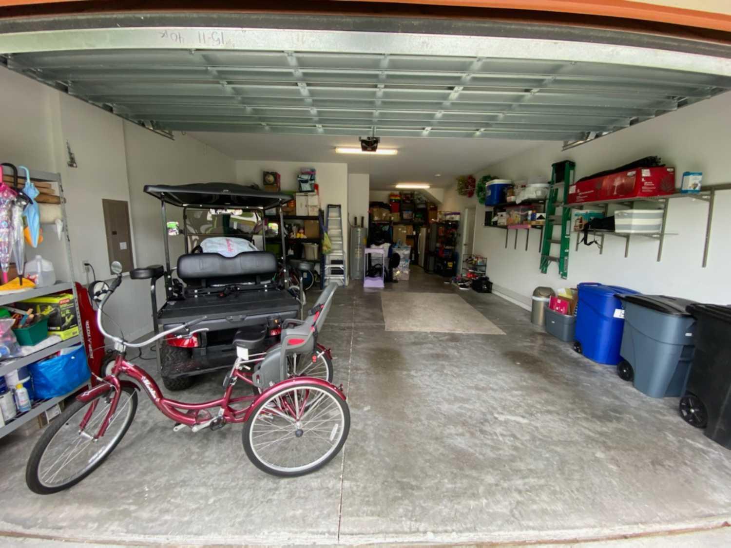The Junkluggers of North Tampa Bay Before & After Photo Set Garage Cleanout in Zephyrhills, FL!