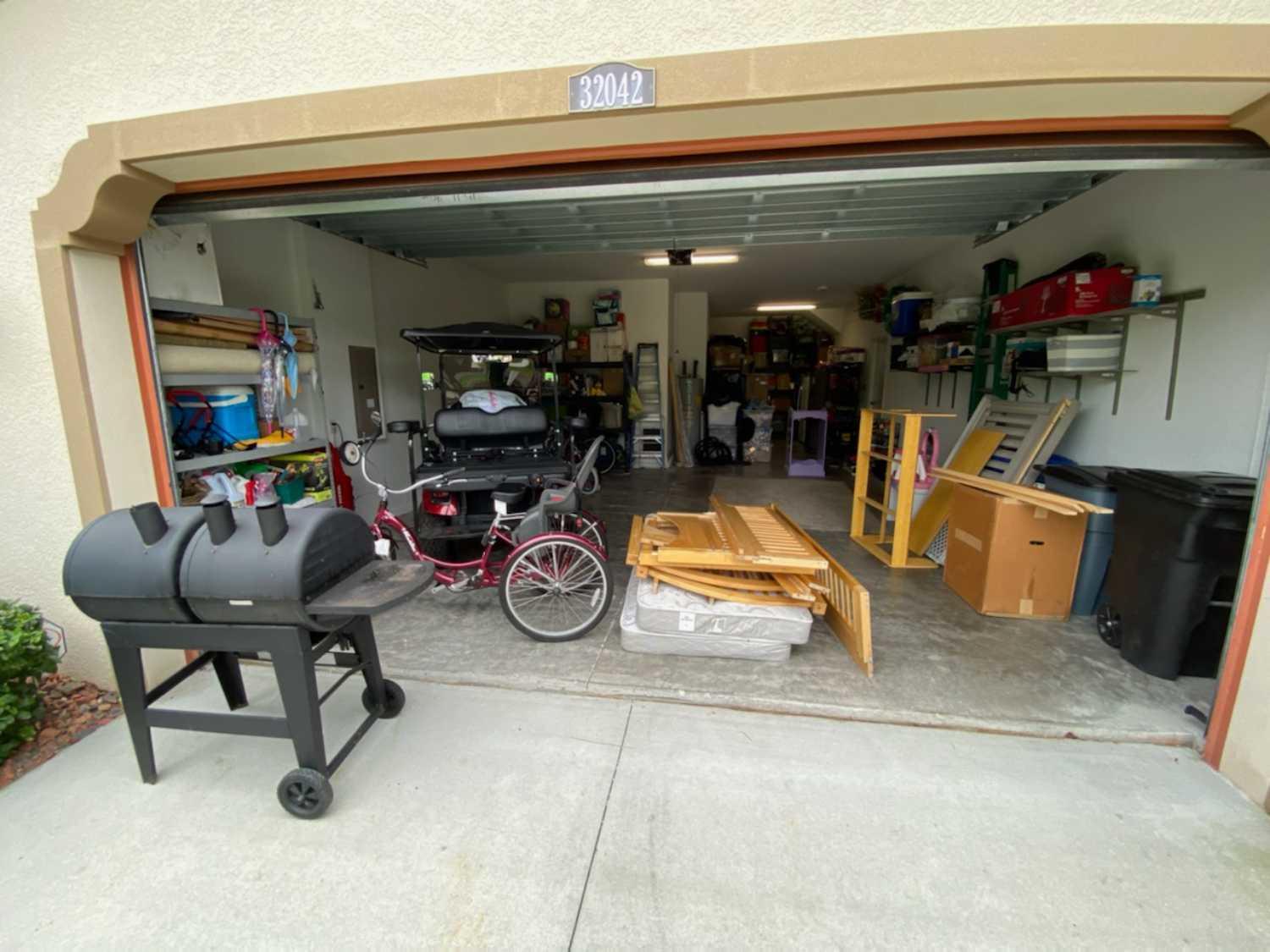 The Junkluggers of North Tampa Bay Before & After Photo Set Garage Cleanout in Zephyrhills, FL!