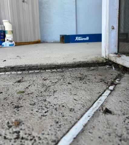 Eliminating Concrete Pool Deck Trip Hazards in Oviedo, Florida - Before Photo