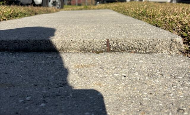 Concrete Trip Hazard Repair in Sanford, FL - Before Photo