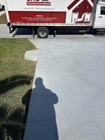 Leveling and Repairing Concrete Driveway in Palm Bay, FL - After Photo