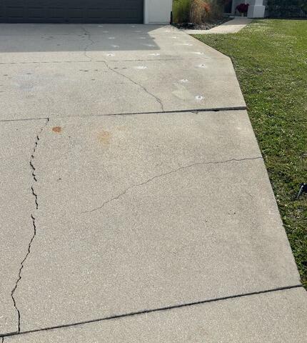 Concrete Driveway Leveling and Crack Repair in Sebastian, FL - Before Photo