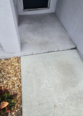 Concrete Walkway Trip Hazard Repair in Sarasota, FL - Before Photo