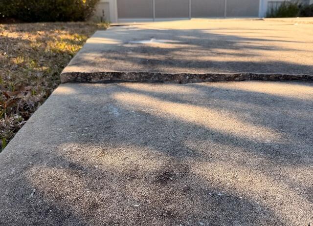 Concrete Driveway Leveling in Dunnellon, FL - Before Photo