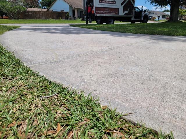 Leveling and Repairing Concrete Driveway in Kissimmee, FL - After Photo