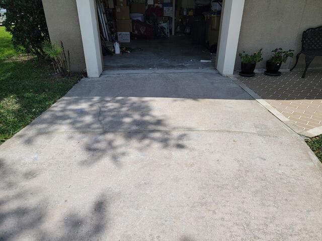 Concrete Driveway Trip Hazard Repaired in Kissimmee, FL