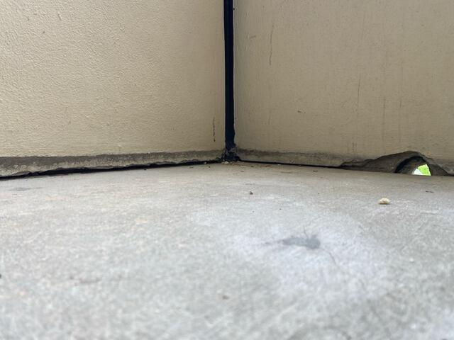 Leveling Concrete Condominium Slabs in Gulfport, FL - Before Photo