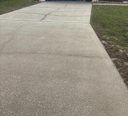 Concrete Driveway Leveled and Repaired in Kissimmee, Florida