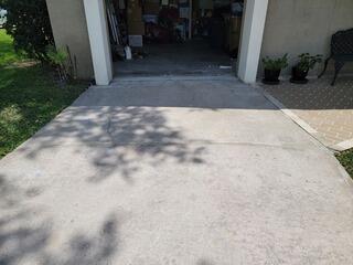 Concrete Driveway Trip Hazard Repaired in Kissimmee, FL