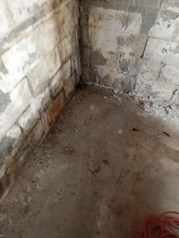 Basement Waterproofing Transformation in Ellenwood, Georgia - Before Photo