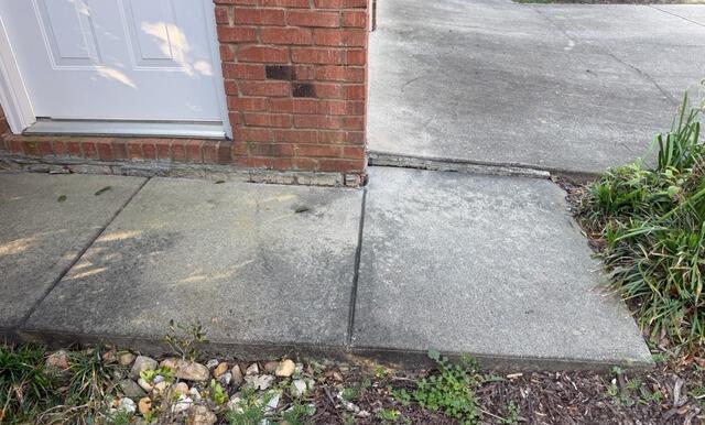 Concrete Leveling Solution in Cumming, Georgia - Before Photo