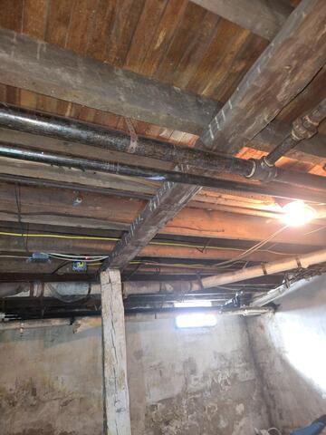 SmartJacks Lift Sagging Floors in Dunmore, PA - Before Photo