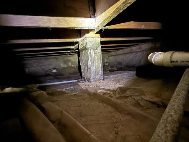 Coastal Crawl Space Protection: Upgrading Drainage for a Waterfront Home - Before Photo