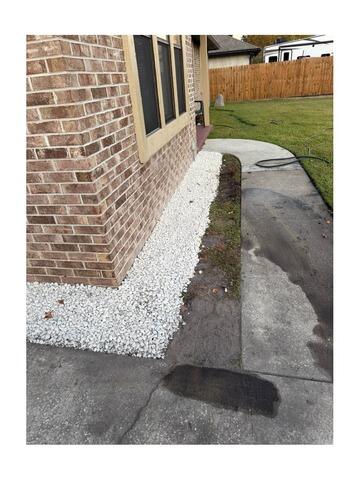 Orange Park, FL - Exterior Drainage System & Gravel Installation for Moisture Control