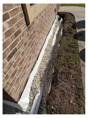 Orange Park, FL - Exterior Drainage System & Gravel Installation for Moisture Control