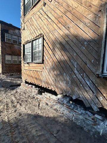 Severe Settlement Corrected with SmartJack Support Posts | Jacksonville, FL - Before Photo