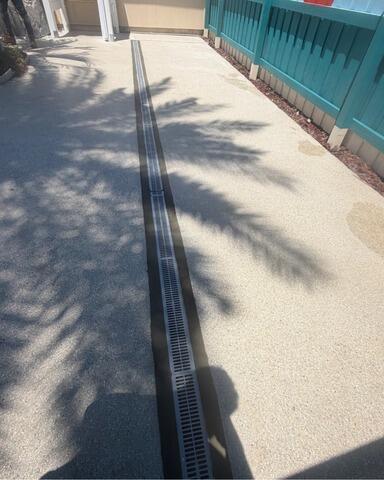 Trench Drain Installation Protects Jacksonville Beach, FL Home from Surface Water Intrusion - After Photo
