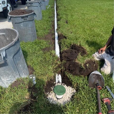 Exterior Drainage System Helps Prevent Driveway Flooding in Jacksonville, FL - Before Photo