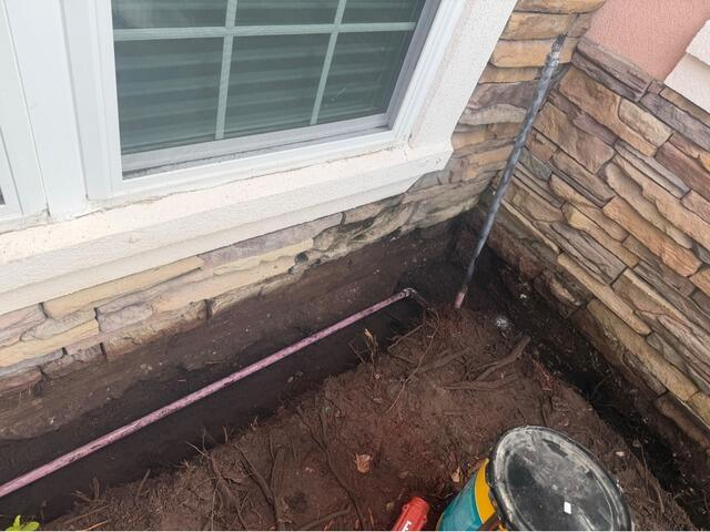 Exterior Drainage System Protects Fleming Island, FL Home from Water Intrusion - Before Photo