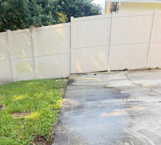 Jacksonville, FL Exterior Drainage Solution for Pool Deck Water Buildup - Before Photo